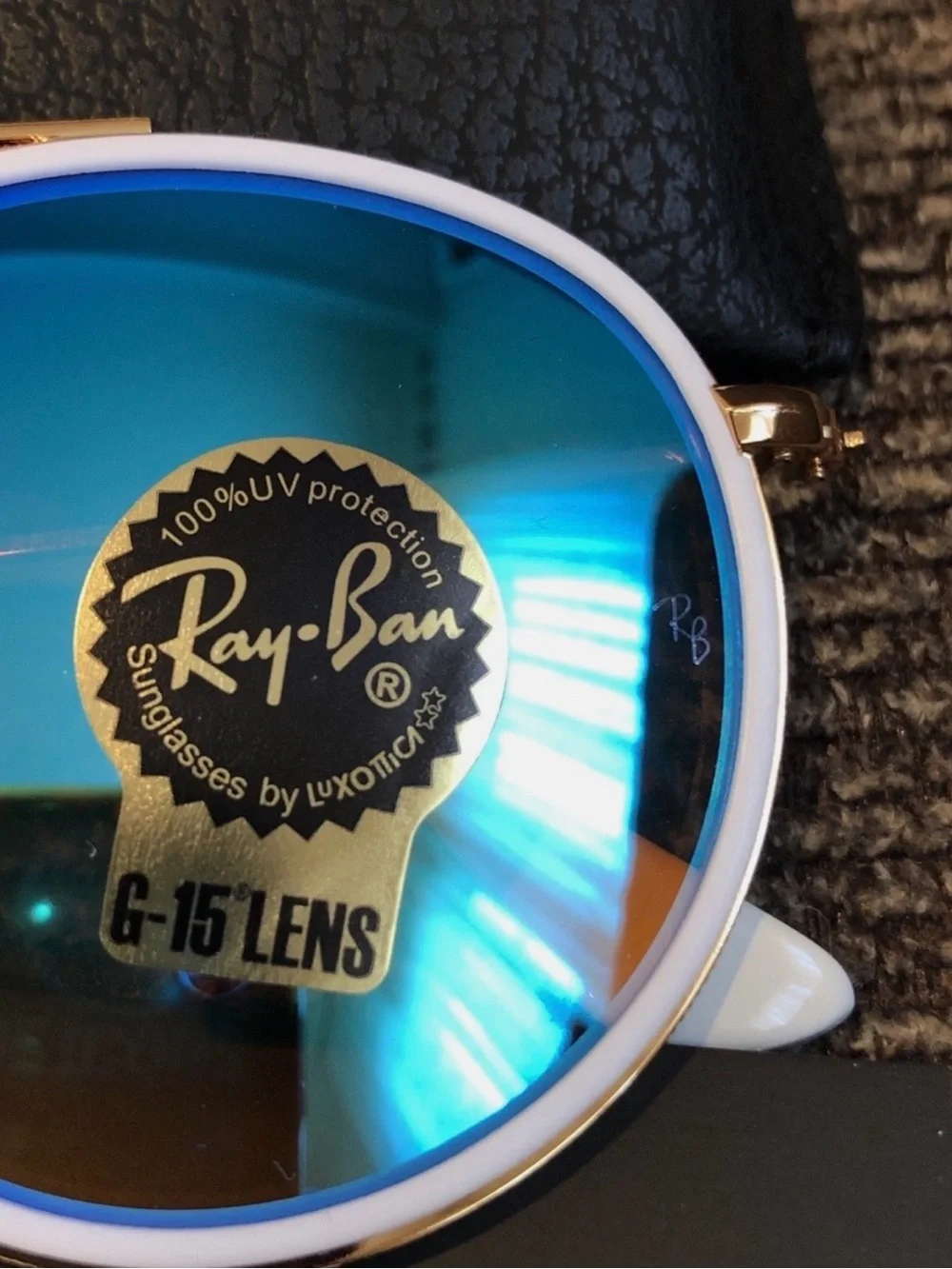 Ray-Ban Gold Frame Sunglasses with Blue Mirror Lenses and White Trim